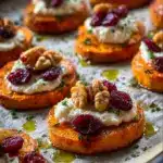 Roasted Sweet Potato Rounds with Herbed Ricotta, Walnuts, and Cranberries Recipe