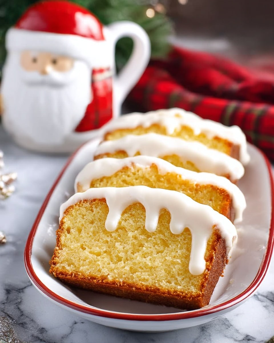 The image shows four slices of a moist yellow pound cake with a golden-brown crust, each slice topped with a thick layer of white icing that drips slightly over the edges. The slices are arranged neatly on a white oval plate with a thin red rim, set on a white marbled surface. In the blurred background, there is a white Santa-shaped mug with a red handle and a red plaid cloth, adding a festive touch. Photo taken with an iphone --ar 4:5 --v 7